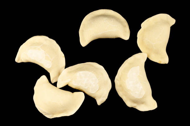 istock Frozen dumplings on a black background 1385795240