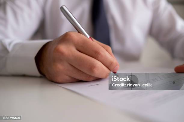 Signing Official Document Stock Photo - Download Image Now - Notary, Document, Lawyer