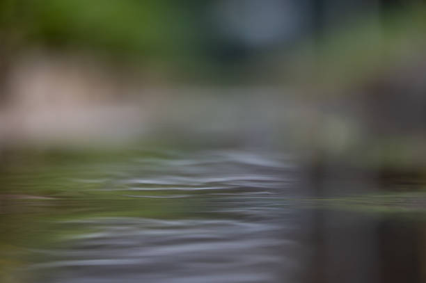 istock Abstract view of a water drain  with a low angle 1385796431