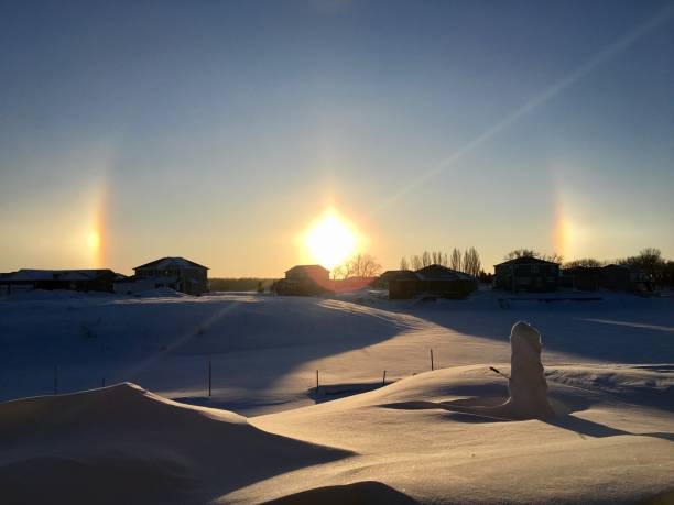 Sun dog with snowman Sun dog with snowman. Calm, inspiring sundog stock pictures, royalty-free photos & images