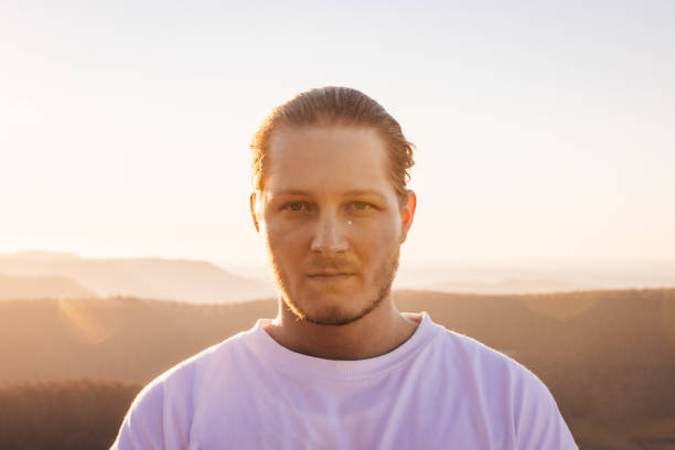 istock Young Man Outdoors Sunset Millennial Generation Portrait 1385809263