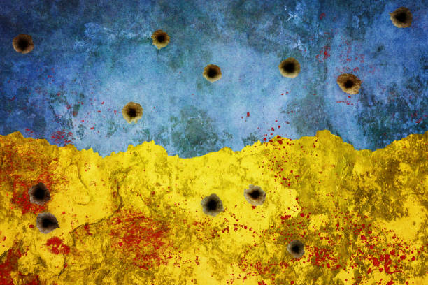 Ukrainian colors on damaged wall stock photo