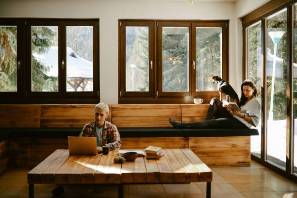 istock young people doing remote work from the mountain cabin 1385827775