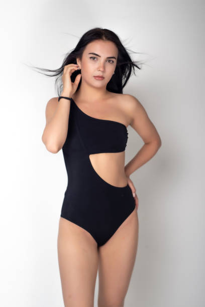 istock Fashion model on the white background. 1385829064