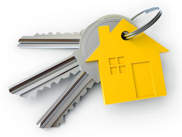 istock house key with charm 1385829212