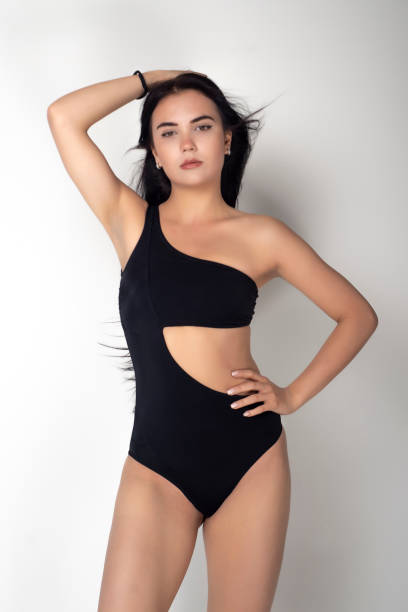 istock Fashion model on the white background. 1385829489