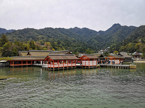 March 25, 2019 - Hiroshima, Japan: People at the Itsukushima Shinto shrine. The shrine complex is listed as a UNESCO World Heritage Site.