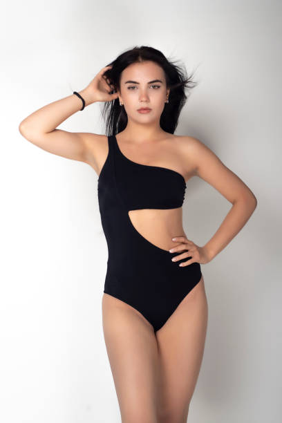 istock Fashion model on the white background. 1385837125