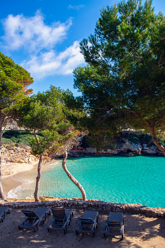 Beautiful beach with azure waters in the Spanish island of Mallorca or Palma de Majorca in the western Mediterranean, Balearic Islands, Spain