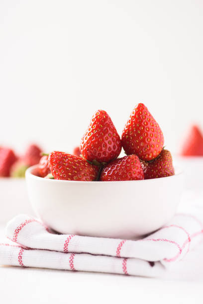 Strawberry fruit from local market on white background stock photo