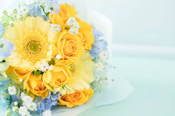 Photo of Bouquet of yellow roses and gerberas