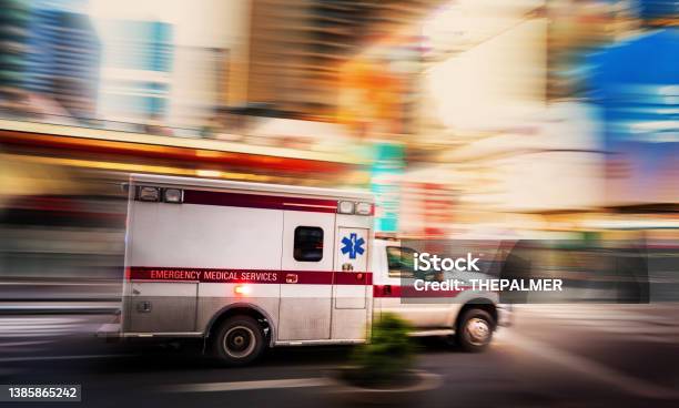 Ambulance Speeding In Manhattan New York Stock Photo - Download Image Now - Ambulance, Emergency Services Occupation, Hospital
