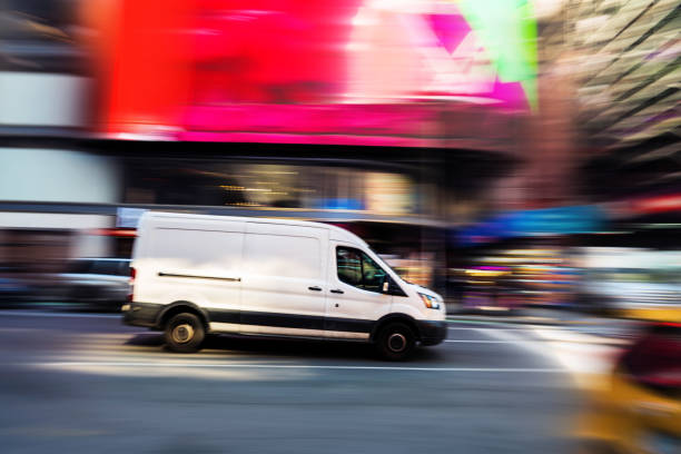 istock White delivery van speeding in the New York 1385865259