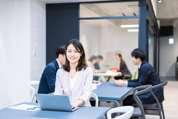 istock A Career Woman Working in an Office 1385869894
