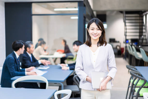 istock A Career Woman Working in an Office 1385869896