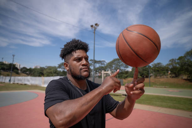 istock playing basketball in the park 1385872420