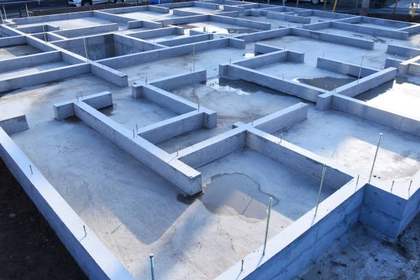A foundation construction site for residential construction. A scene of a foundation construction site for residential construction. reinforced concrete stock pictures, royalty-free photos & images
