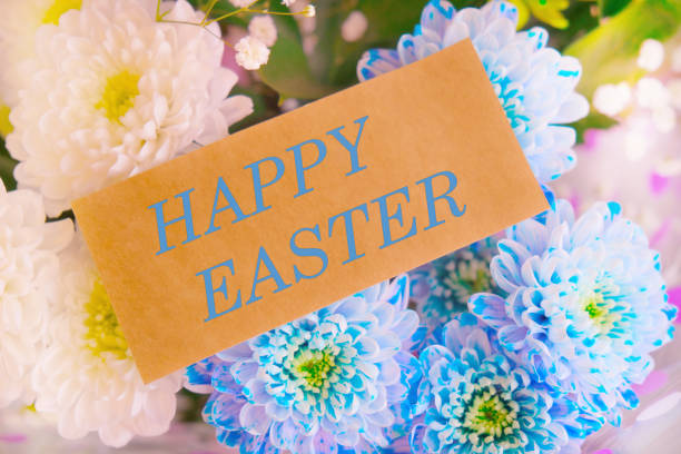 Spring Easter card. Happy Easter text on greeting card, Bouquet of chrysanthemums background