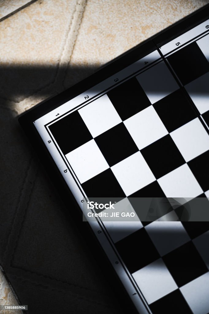 A chessboard in the sun Advice Stock Photo