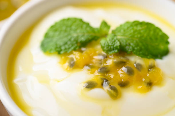 istock Yogurt with passion fruit in bowl, Healthy eating 1385895937