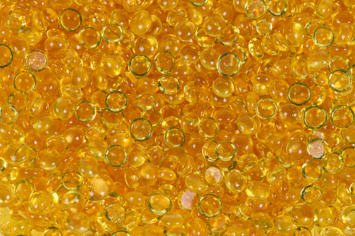 Yellow pellets of resin used for hot melt adhesives
