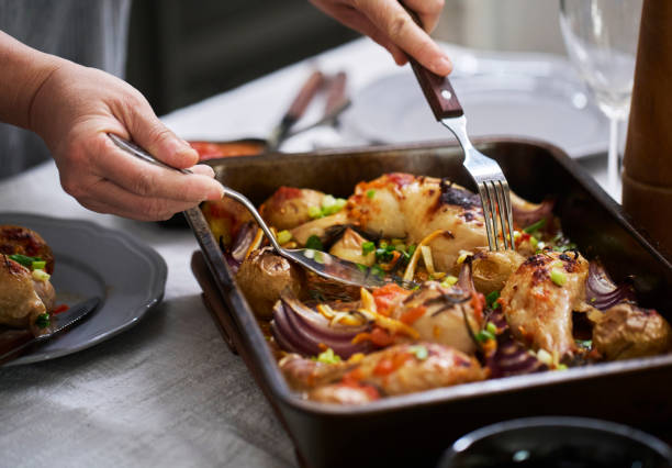 home cooking: baked chicken leg with potatoes and onions