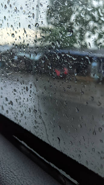 istock Abstract raindrops on glass, background, texture, shadows 1385913197