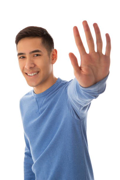 istock Smiling young adult man gesturing high five 1385915307