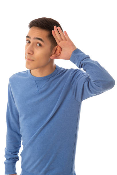 istock Young adult man listening expression 1385915553