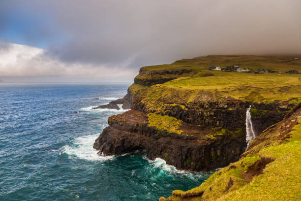 istock View of Mulafossur Waterfall, Faroe Islands. 1385916872