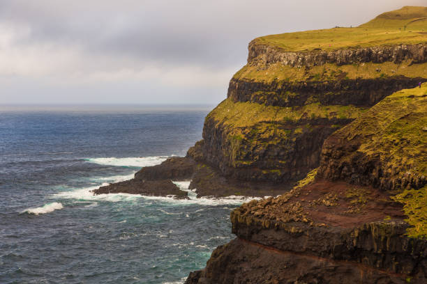 istock View of Mulafossur Waterfall, Faroe Islands. 1385916896
