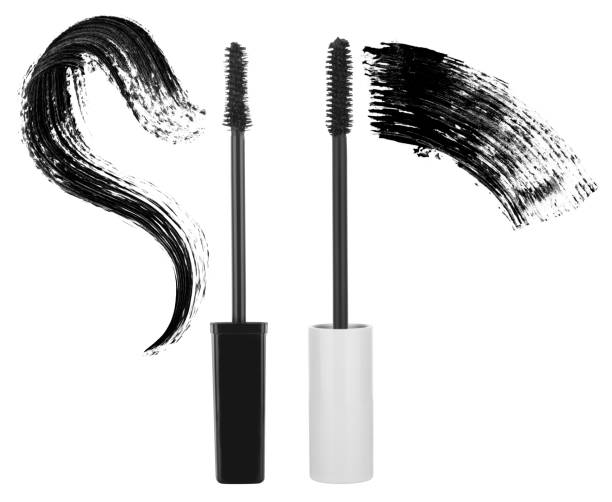istock Two black and white mascara brushes with mascara strokes isolated on white background, clipping path included 1385928205