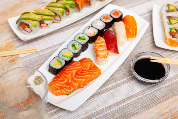 istock Sushi set with maki rolls and nigiri 1385928386