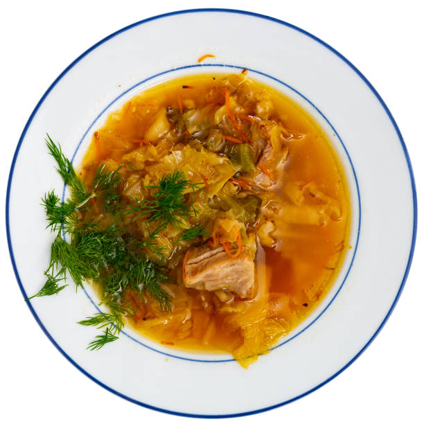 istock Thick cabbage soup shchi with pork cooked in mushroom broth 1385929260