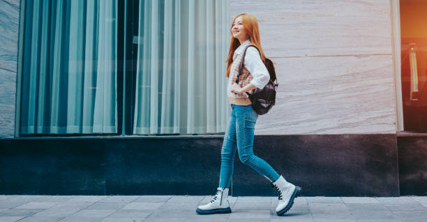Young Asian woman going to work