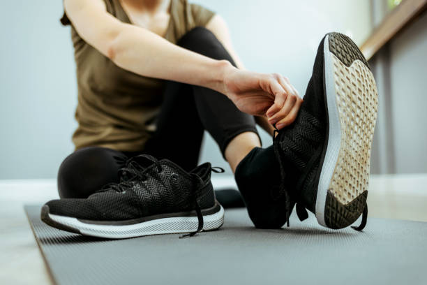 istock Young Woman Getting ready for her Daily Jogging Routine 1385933363