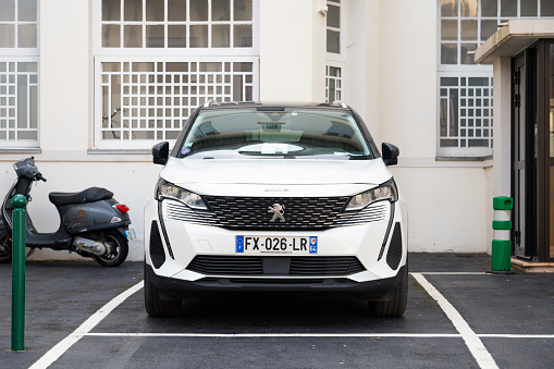 Biarritz, France - 13 March 2022: Front view of a Peugeot 3008 stationary in a city street