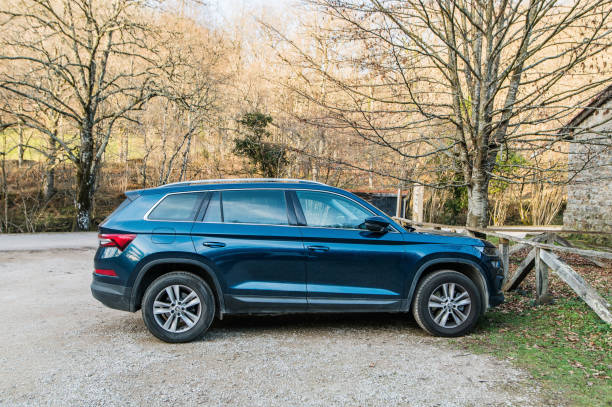 Ucieda, Spain - 28 February 2022: A Skoda Kodiaq large SUV car in a forest area