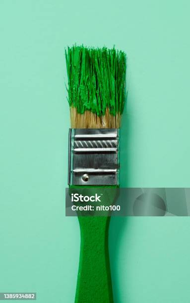 Paintbrush With Green Paint Stock Photo - Download Image Now - Greenwashing, Concepts, Paint