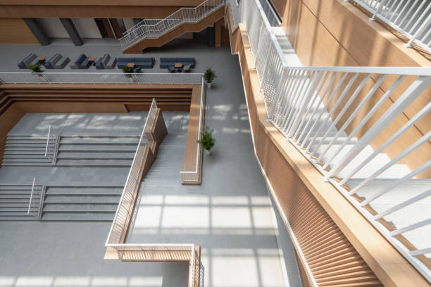 istock The sun shines on the new beautiful library and forms a special effect with the internal structure 1385937011