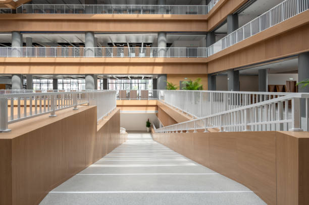 istock The sun shines on the new beautiful library and forms a special effect with the internal structure 1385937287