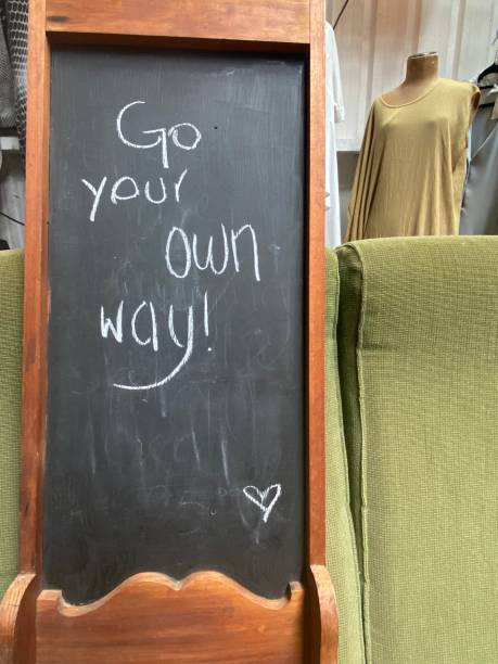 istock Chalk Board Sign: Go Tour Own Way 1385937563