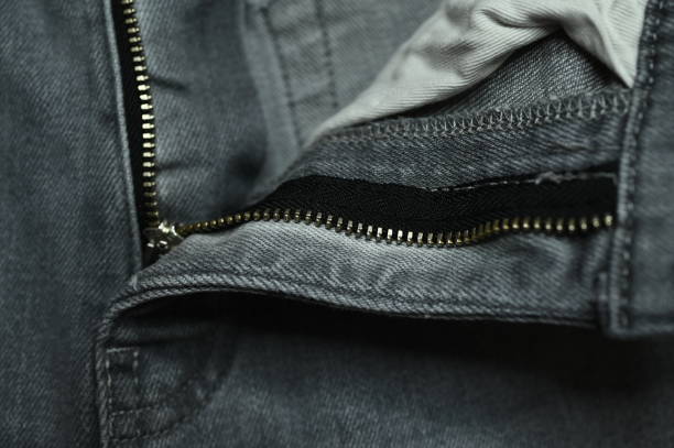istock metallic zip on denim jeans 1385944599