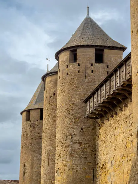 Photo of Ruins of the fortified medieval citadel of Carcassone, Aude, Occitanie, France. An imposing UNESCO World Heritage Site