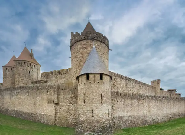 Photo of Ruins of the fortified medieval citadel of Carcassone, Aude, Occitanie, France. An imposing UNESCO World Heritage Site