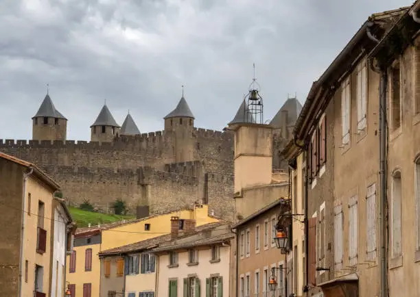 Photo of Ruins of the fortified medieval citadel of Carcassone, Aude, Occitanie, France. An imposing UNESCO World Heritage Site