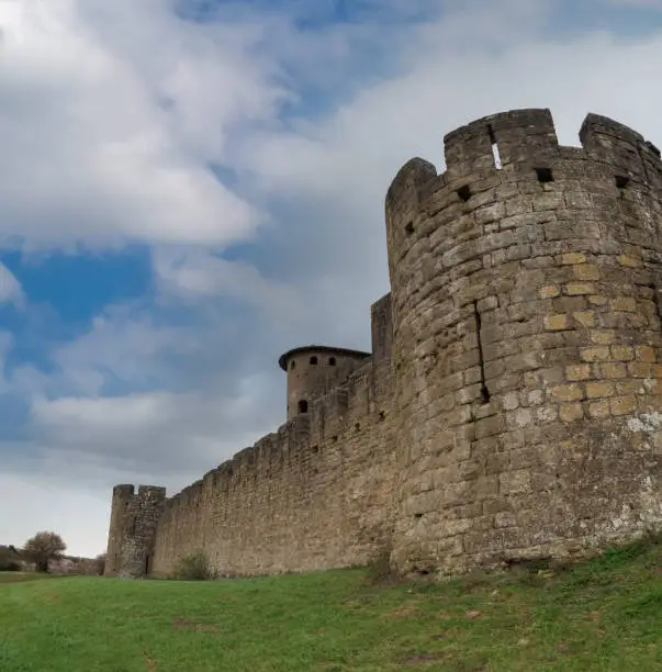 Photo of Ruins of the fortified medieval citadel of Carcassone, Aude, Occitanie, France. An imposing UNESCO World Heritage Site