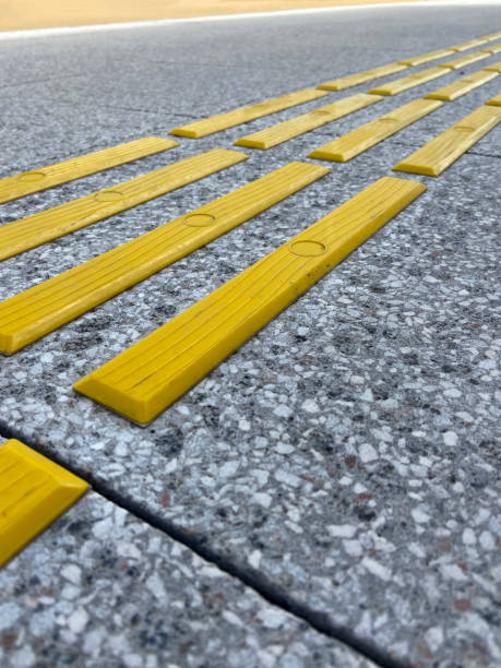 istock Bright yellow tactile paving for the visually impaired 1385944762