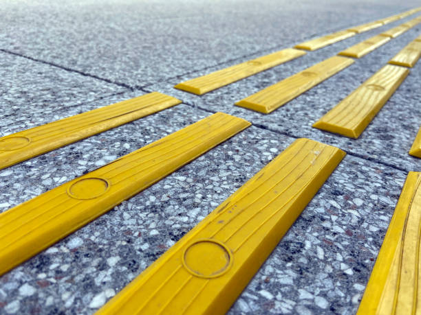 istock Bright yellow tactile paving for the visually impaired 1385944763