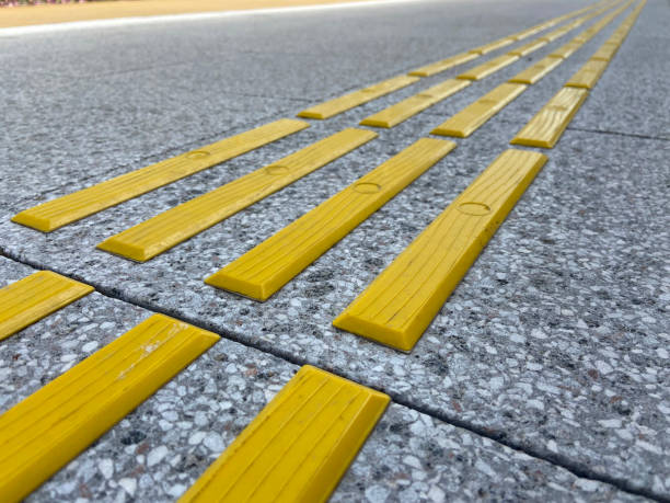 istock Bright yellow tactile paving for the visually impaired 1385944767